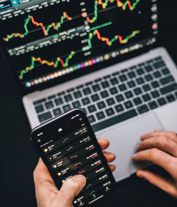 Risk analysis charts and financial data visualization on monitors
